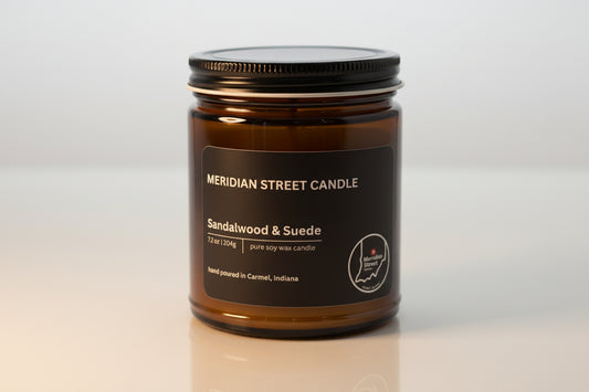 Meridian Street Candle jar with sandalwood and suede scent on a light gray background